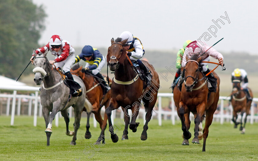 Ragosina-0002 
 RAGOSINA (centre, Daniel Muscutt) beats MOONLIT CLOUD (right) and LETHAL TOUCH (left) in The Minzaal Bred At Ringfort Stud Fillies Handicap
Newmarket 30 Jun 2023 - Pic Steven Cargill / Racingfotos.com