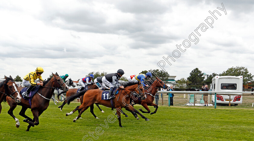 Yarmouth-0002 
 The field races past the holiday camp site shortly after the start of the Mansionbet Beaten By A Head Maiden Handicap
Yarmouth 22 Jul 2020 - Pic Steven Cargill / Racingfotos.com