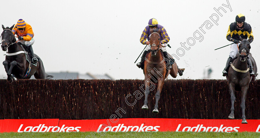 Gold-Present-0005 
 GOLD PRESENT (left, Nico de Boinville) beats WARRIORS TALE (centre) and GENTLEMAN JON (right) in The Sir Peter O'Sullevan Memorial Handicap Chase Newbury 2 Dec 2017 - Pic Steven Cargill / Racingfotos.com