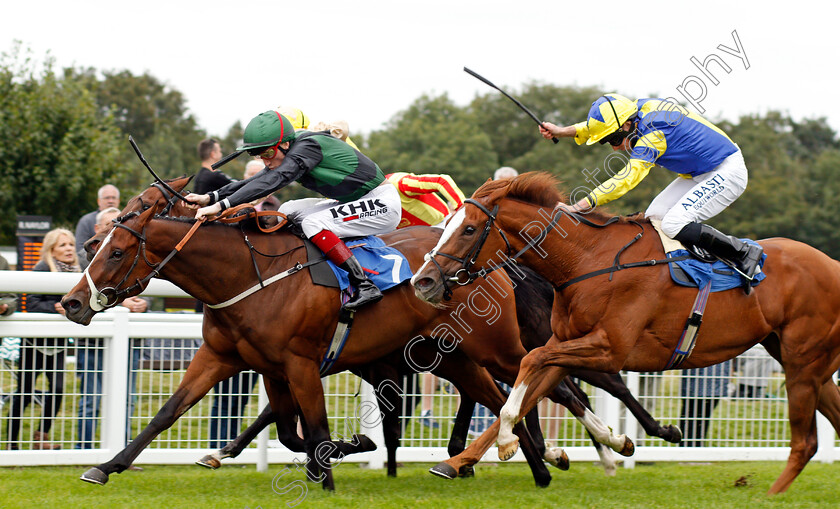 Chocoya-0002 
 CHOCOYA (right, Ryan Moore) beats SILENT FLAME (left) in The European Bloodstock News EBF Lochsong Fillies Handicap
Salisbury 2 Sep 2021 - Pic Steven Cargill / Racingfotos.com