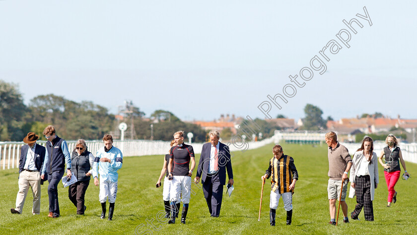 Yarmouth-Abandonment-0002 
 RICHARD ALDOUS (suit) clerk of the course at Yarmouth Racecourse, on the track with jockeys P J MCDONALD (stripes) and LUKE MORRIS (left) before racing is abandoned after 3 races
Yarmouth 3 Aug 2020 - Pic Steven Cargill / Racingfotos.com