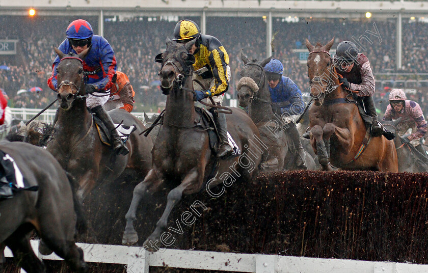 Splash-Of-Ginge-0001 
 SPLASH OF GINGE (left, Tom Bellamy) jumps with STARCHITECT (centre) on his way to winning The BetVictor Gold Cup Cheltenham 18 Nov 2017 - Pic Steven Cargill / Racingfotos.com