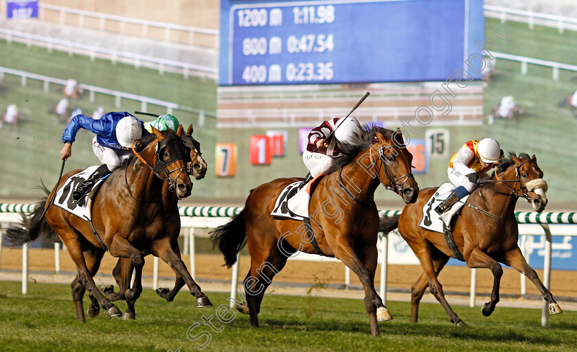 Wasim-0003 
 WASIM (Adrie De Vries) beats ZAMAN (left) and CENTENARY DIAMOND (right) in The Meydan Classic Trial Meydan 8 Feb 2018 - Pic Steven Cargill / Racingfotos.com