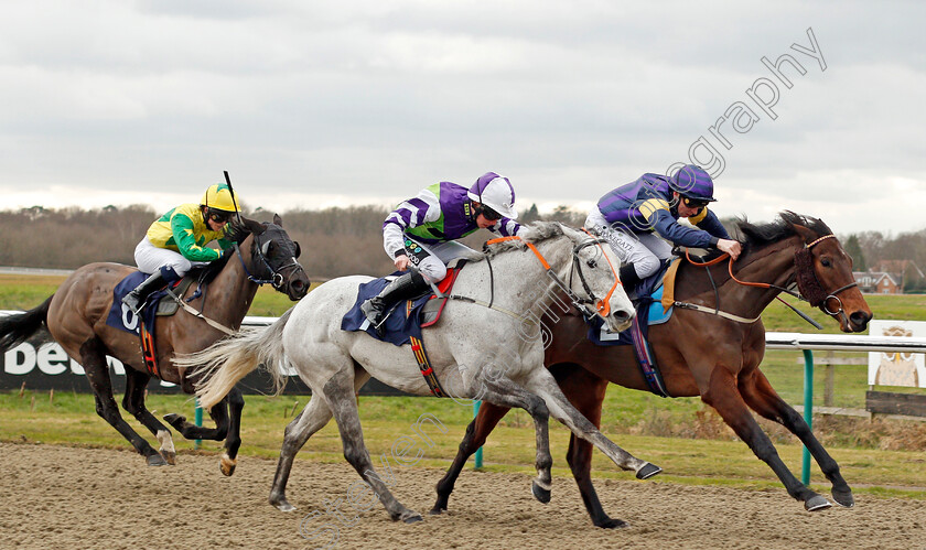 Miss-Minuty-0002 
 MISS MINUTY (centre, Jason Watson) beats ASSANILKA (right) wins The 32Red.com Fillies Handicap Lingfield 2 Feb 2018 - Pic Steven Cargill / Racingfotos.com