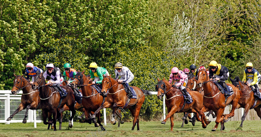 Bahamian-Sunrise-0001 
 winner BAHAMIAN SUNRISE (pink, Silvestre de Sousa) with the field through the first furlong of The Investec Asset Finance Handicap Epsom 25 Apr 2018 - Pic Steven Cargill / Racingfotos.com