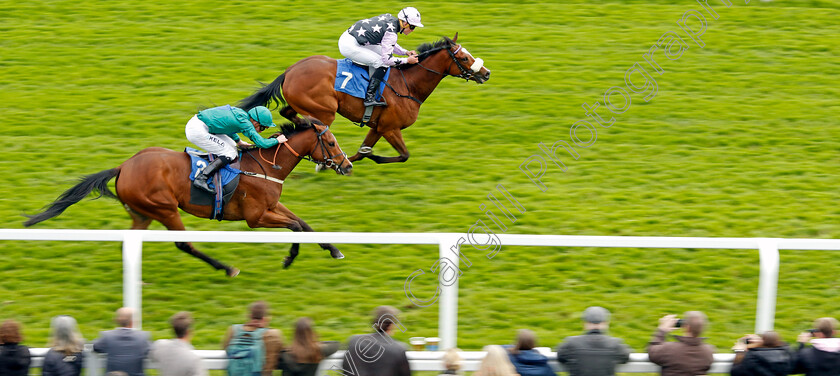 Expressionless-0001 
 EXPRESSIONLESS (farside, Kyle Strydom) beats ALPHA CRUCIS (nearside) in The Warren Handicap
Epsom 25 Apr 2023 - Pic Steven Cargill / Racingfotos.com