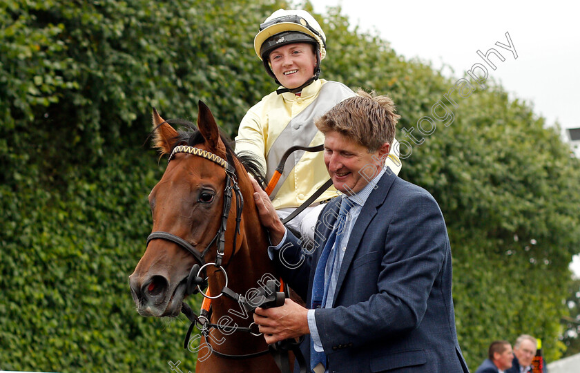 Romantic-Time-0008 
 ROMANTIC TIME (Hollie Doyle) with trainer William Stone after The IRE Incentive Scheme Dick Poole Fillies Stakes
Salisbury 2 Sep 2021 - Pic Steven Cargill / Racingfotos.com