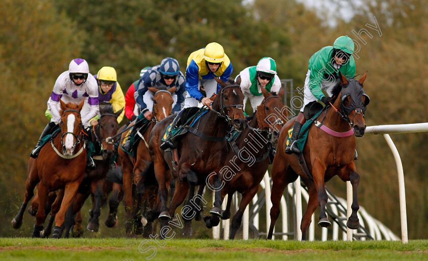 Eclat-Des-Mottes-0002 
 ECLAT DES MOTTES (right, James Best) leads A LITTLE CHAOS (centre) and eventual winner CARYS' COMMODITY (pink and green, Jonjo O'Neill Jr) during The Champions Day Form Study On attheraces.com/ascot Handicap Hurdle
Fakenham 16 Oct 2020 - Pic Steven Cargill / Racingfotos.com