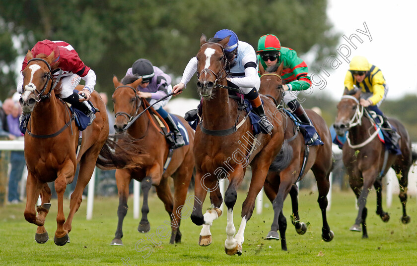 Premiere-Beauty-0003 
 PREMIERE BEAUTY (centre, Dylan Hogan) beats NAMMOS (left) in The British EBF Fillies Novice Stakes
Yarmouth 15 Sep 2022 - Pic Steven Cargill / Racingfotos.com