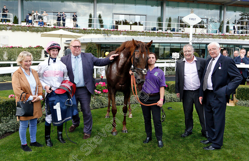 What-A-Welcome-0012 
 WHAT A WELCOME (Joey Haynes) with trainer Patrick Chamings (left) and owners after The Canaccord Genuity Gordon Carter Handicap
Ascot 5 Oct 2018 - Pic Steven Cargill / Racingfotos.com