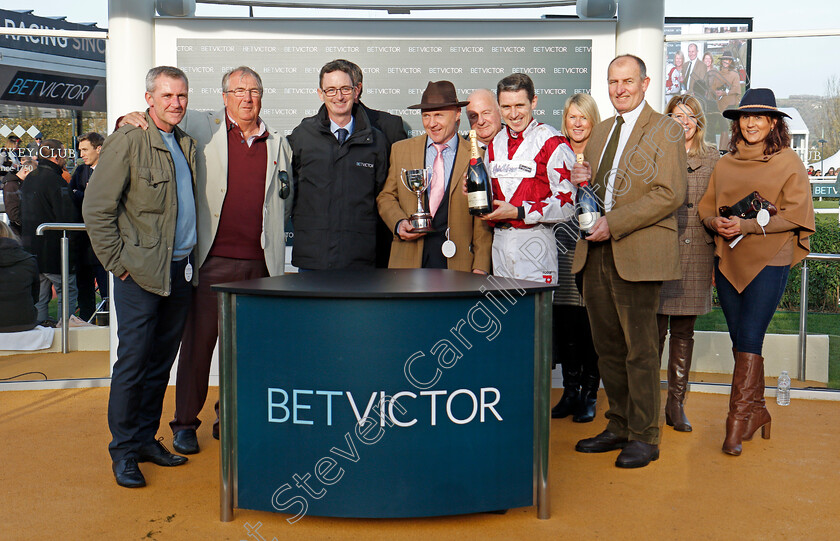 Doitforthevillage-0007 
 Presentation to Paddy Brennan, Paul Henderson (right) and owners for The BetVictor Handicap Chase won by DOITFORTHEVILLAGE Cheltenham 17 Nov 2017 - Pic Steven Cargill / Racingfotos.com