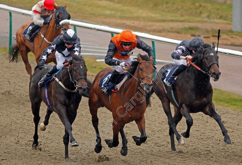 Marshal-Dan-0004 
 MARSHAL DAN (centre, Luke Morris) beats GOLDEN FOOTSTEPS (left) and CLOUD EIGHT (right) in The 32Redpoker.com Handicap Lingfield 14 Feb 2018 - Pic Steven Cargill / Racingfotos.com