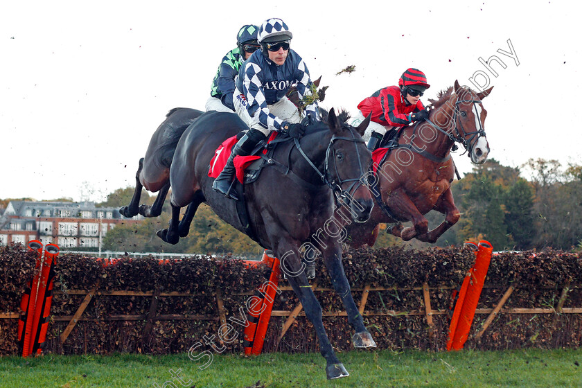 Captain-Simon-0001 
 CAPTAIN SIMON (left, Harry Skelton) jumps with RESILIENCY (right) Sandown 12 Nov 2017 - Pic Steven Cargill / Racingfotos.com