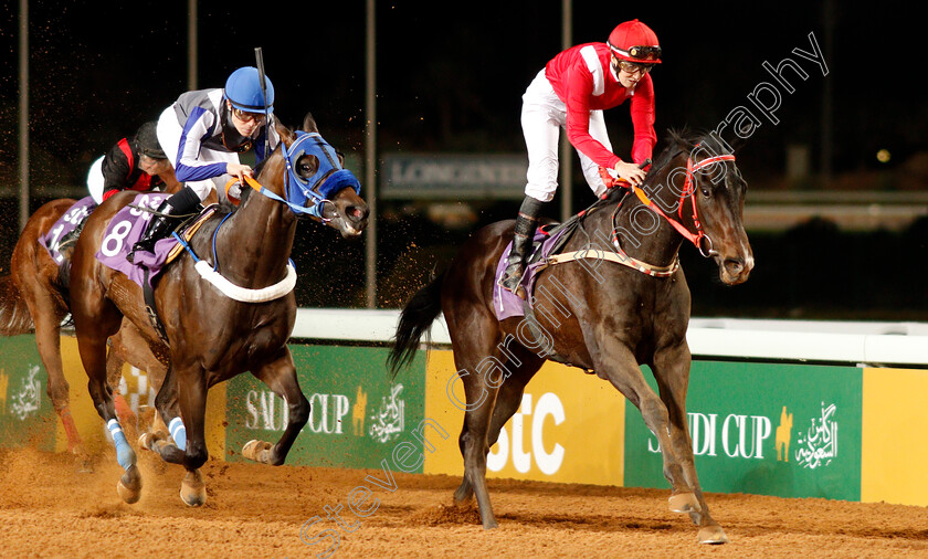 Sabeq hom-0003 
 SABEQ'HOM (Sibylle Vogt) beats ALSHATHERWAN (left) in The International Jockeys Challenge Handicap Round4
King Abdulaziz Racetrack, Riyadh, Saudi Arabia 28 Feb 2020 - Pic Steven Cargill / Racingfotos.com