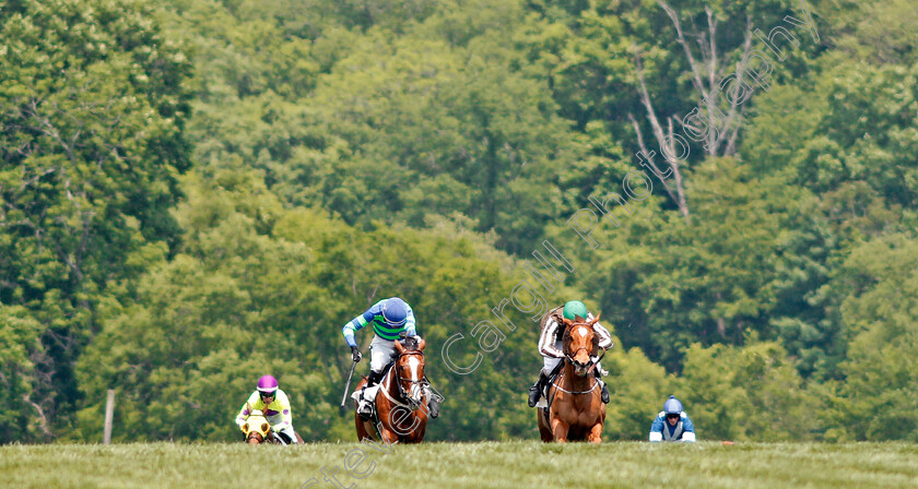 Three-Kingdoms-0001 
 THREE KINGDOMS (right, Kieran Norris) beats SCHOODIC (left) in The Bright Hour Handicap Hurdle at Percy Warner Park, Nashville 12 May 2018 - Pic Steven Cargill / Racingfotos.com