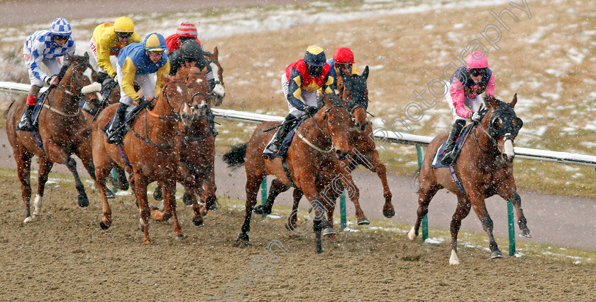 Lingfield-0002 
 ASK THE GURU (Robert Havlin) leads the field in the snow at Lingfield in race won by ROUNDABOUT MAGIC (black) 27 Feb 2018 - Pic Steven Cargill / Racingfotos.com