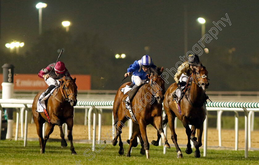 Moqtarreb-0005 
 MOQTARREB (centre, Dane O'Neill) beats OUZO (right) in The Valley Handicap
Meydan, Dubai 3 Feb 2023 - Pic Steven Cargill / Racingfotos.com