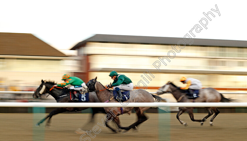 Something-Lucky-0004 
 SOMETHING LUCKY (centre, Alistair Rawlinson) beats BLASTOFMAGIC (left) in The Betway Sprint Handicap Lingfield 10 Jan 2018 - Pic Steven Cargill / Racingfotos.com