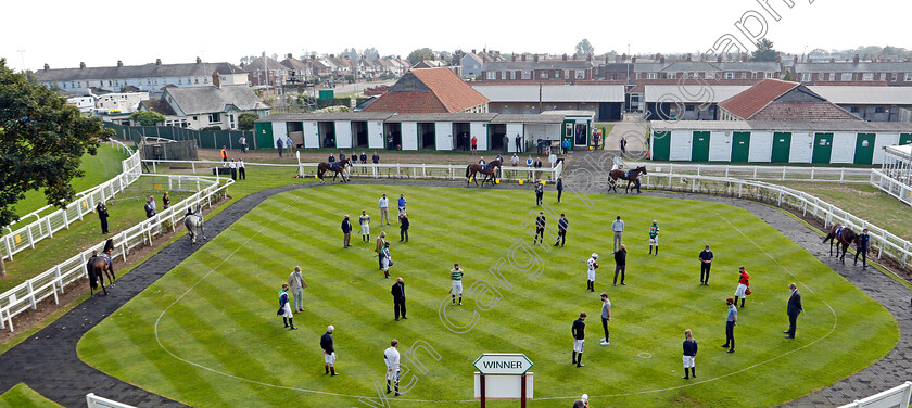 Pat-Smullen-silence-0002 
 Jockeys and staff observe a minute's silence in honour of Pat Smullen in the parade ring prior to the first race
Yarmouth 16 Sep 2020 - Pic Steven Cargill / Racingfotos.com