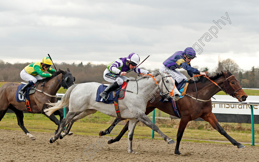 Miss-Minuty-0003 
 MISS MINUTY (centre, Jason Watson) beats ASSANILKA (right) wins The 32Red.com Fillies Handicap Lingfield 2 Feb 2018 - Pic Steven Cargill / Racingfotos.com