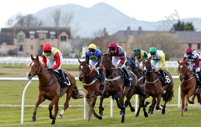 Musselburgh-0003 
 DRAGON MOUNTAIN leads the field down the back straight in the the Like Racing TV On Facebook Handicap won by CHAMPARISI (yellow sleeves, Sam James)
Musselburgh 2 Apr 2019 - Pic Steven Cargill / Racingfotos.com