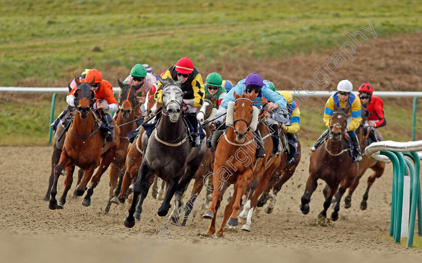 Locommotion-0002 
 LOCOMMOTION (red cap, Luke Morris) beats SOARING SPIRITS (purple cap) in The Play Jackpot Games At sunbets.co.uk/vegas Handicap Lingfield 30 Dec 2017 - Pic Steven Cargill / Racingfotos.com