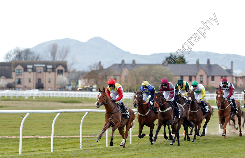 Musselburgh-0002 
 DRAGON MOUNTAIN leads the field down the back straight in the the Like Racing TV On Facebook Handicap won by CHAMPARISI (yellow sleeves, Sam James)
Musselburgh 2 Apr 2019 - Pic Steven Cargill / Racingfotos.com