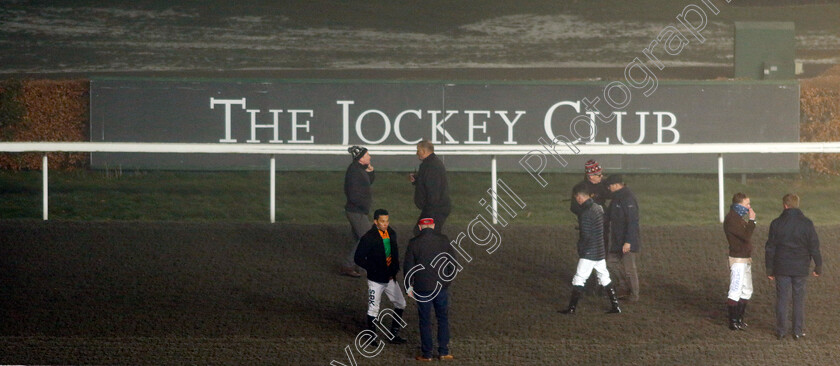 Kempton-0004 
 Jockeys, trainers and officials inspect the track prior racing's abandonment after the 2nd race
Kempton 16 Dec 2022 - pic Steven Cargill / Racingfotos.com