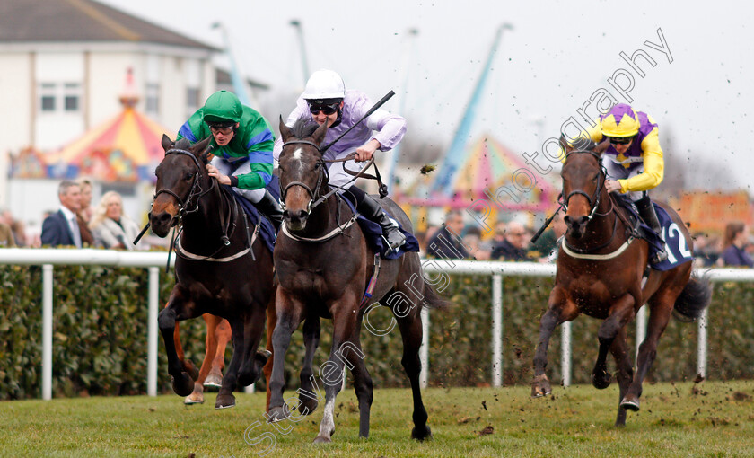 Izzer-0002 
 IZZER (centre, Charles Bishop) beats BROKEN SPEAR (left) in The Unibet Brocklesby Stakes Doncaster 24 Mar 2018 - Pic Steven Cargill / Racingfotos.com