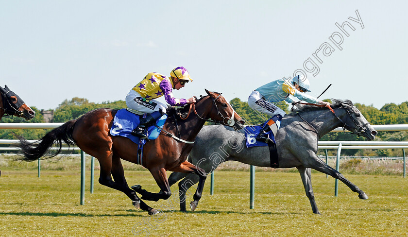 Rasima-0004 
 RASIMA (David Egan) beats DADDIES GIRL (left) in The Read Silvestre De Sousa At 188bet Fillies Handicap Nottingham 22 May 2018 - Pic Steven Cargill / Racingfotos.com