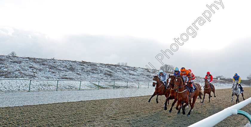 Lingfield-0005 
 Action in the snow at Lingfield in race won by FRENCH MIX (red cap, 2nd right) 27 Feb 2018 - Pic Steven Cargill / Racingfotos.com