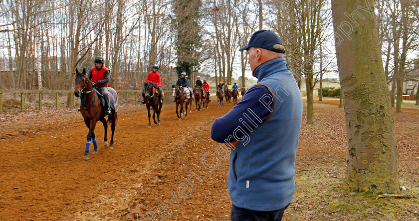 John-Gosden-0006 
 JOHN GOSDEN watches his two year olds return from the gallops at Newmarket 23 Mar 2018 - Pic Steven Cargill / Racingfotos.com