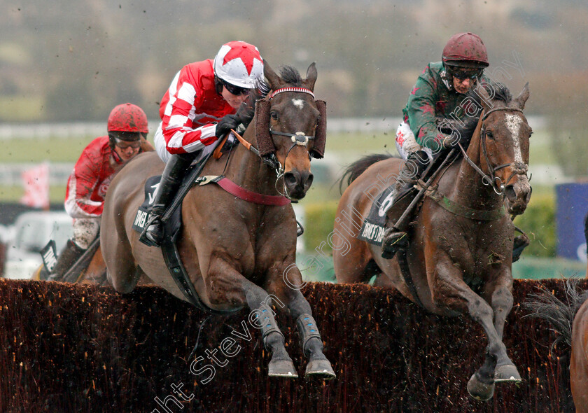 Mister-Whitaker-0001 
 MISTER WHITAKER (right, A P Heskin) jumps with SOLSTICE STAR (left) on his way to winning The Timeform Novices Handicap Chase Cheltenham 27 Jan 2018 - Pic Steven Cargill / Racingfotos.com