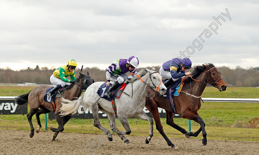 Miss-Minuty-0001 
 MISS MINUTY (centre, Jason Watson) beats ASSANILKA (right) wins The 32Red.com Fillies Handicap Lingfield 2 Feb 2018 - Pic Steven Cargill / Racingfotos.com