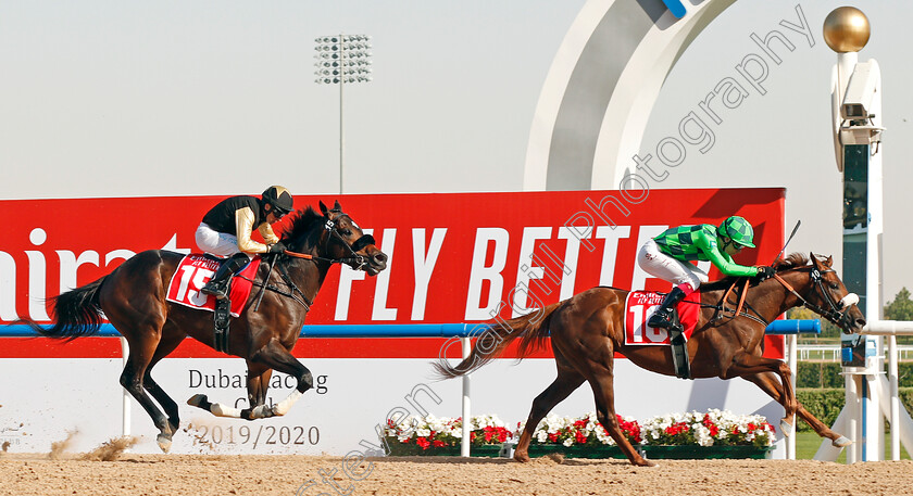 Emblem-Storm-0004 
 EMBLEM STORM (Oisin Murphy) beats TUZ (left) in The Al Bastakiya
Meydan 7 Mar 2020 - Pic Steven Cargill / Racingfotos.com