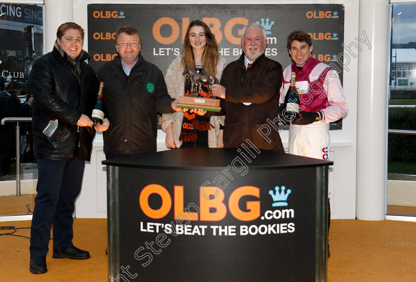 Momella-0011 
 Presentation to Harry Skelton, Dan Skelton and owners for The OLBG Mares Handicap Hurdle won by MOMELLA Cheltenham 16 Dec 2017 - Pic Steven Cargill / Racingfotos.com