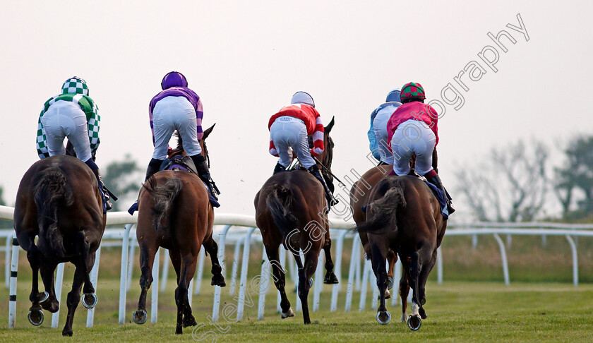 Summer s-Knight-0002 
 SUMMER'S KNIGHT (red, Luke Morris) leads the field with a circuit to go in The Follow At The Races On Twitter Handicap
Bath 23 Jun 2021 - Pic Steven Cargill / Racingfotos.com