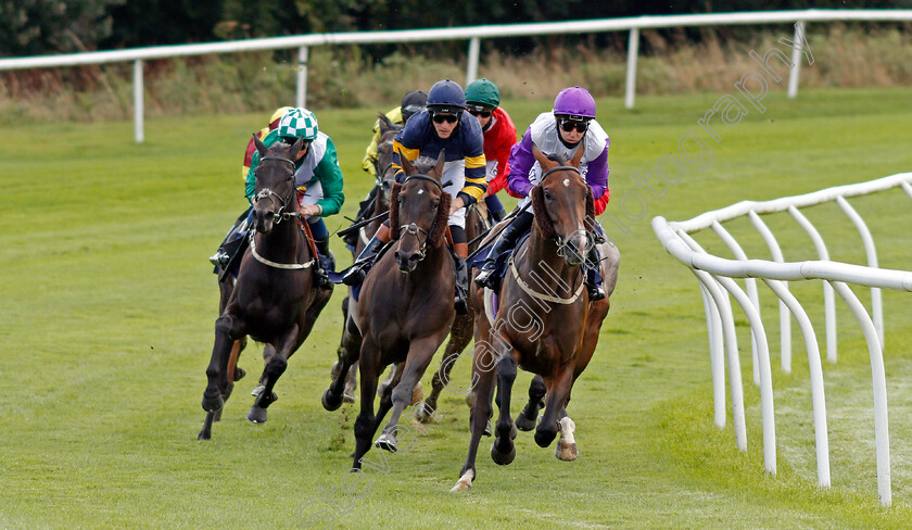 Treaty-Of-Dingle-0001 
 TREATY OF DINGLE (left, William Buick) tracks ITSALLABOUTLUCK (centre) and EVENTFUL (right) round the home turn on her way to winning The Betway Claiming Stakes
Lingfield 26 Aug 2020 - Pic Steven Cargill / Racingfotos.com