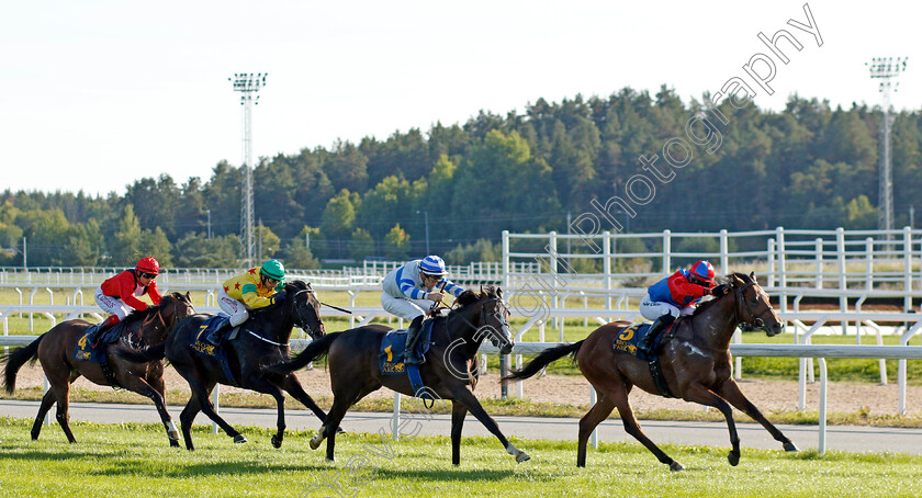 King-Of-Ten-0004 
 KING OF TEN (Elione Chaves) beats STAMFORD STREET (2nd right) in The Appel Au Maitre Svealandlopning
Bro Park, Sweden 17 Sep 2023 - Pic Steven Cargill / Racingfotos.com