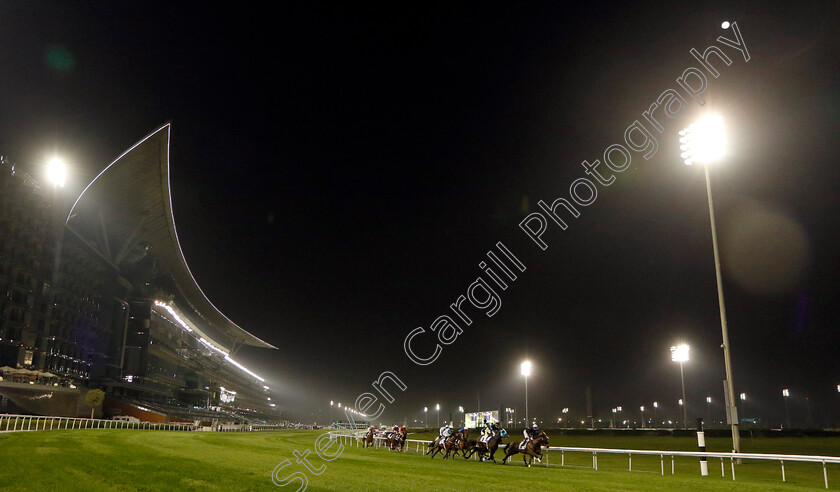 Meydan-0002 
 Runners pass the stands in The Vazirabad Handicap
Meydan, Dubai 3 Feb 2023 - Pic Steven Cargill / Racingfotos.com