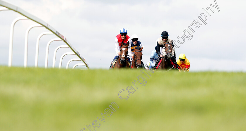 Against-The-Odds-0001 
 AGAINST THE ODDS (left, Fran Berry) leads the field at Sandown
Sandown 16 Jun 2018 - Pic Steven Cargill / Racingfotos.com