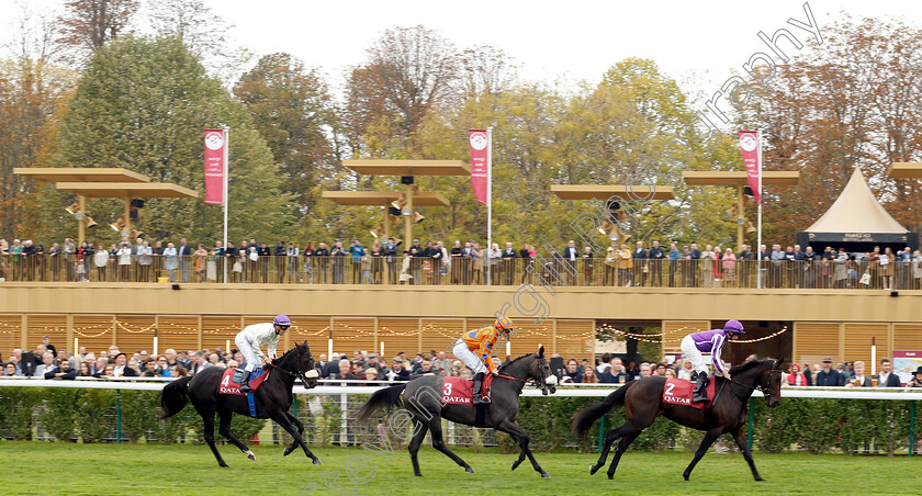 Lily s-Candle-0001 
 LILY'S CANDLE (centre, Pierre-Charles Boudot) going to the start for The Qatar Prix Marcel Boussac
Longchamp 7 Oct 2018 - Pic Steven Cargill / Racingfotos.com