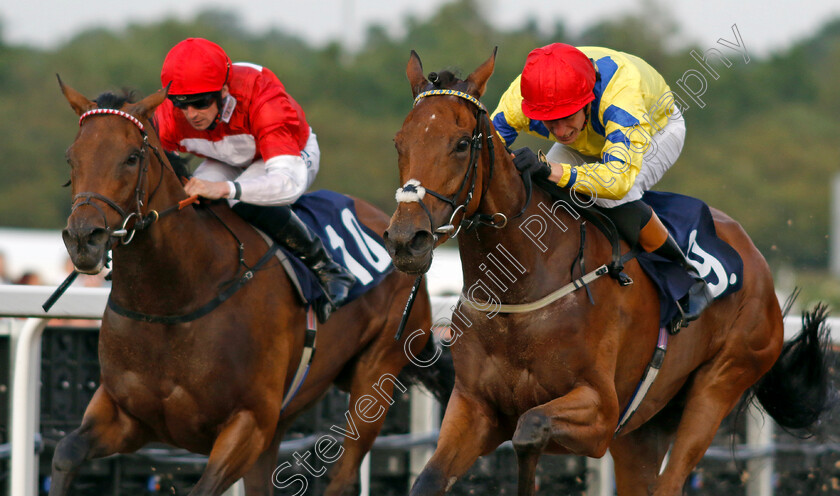 Poptronic-0006 
 POPTRONIC (right, Sam James) beats ROGUE MILLENNIUM (left) in The Jenningsbet Hoppings Fillies Stakes
Newcastle 24 Jun 2022 - Pic Steven Cargill / Racingfotos.com