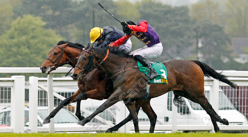 Crystal-Ocean-0005 
 CRYSTAL OCEAN (farside, Ryan Moore) beats FABRICATE (nearside) in The bet365 Gordon Richards Stakes Sandown 27 Apr 2018 - Pic Steven Cargill / Racingfotos.com