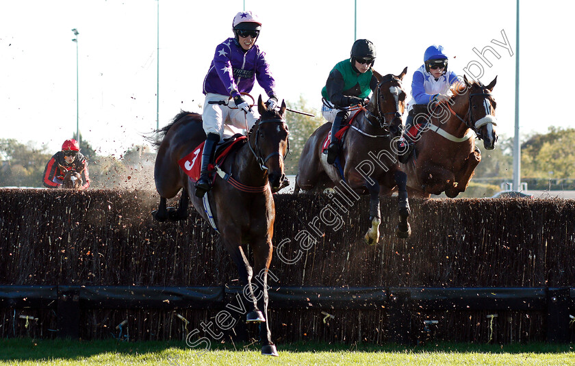 A-Place-Apart-0001 
 A PLACE APART (centre, James Bowen) jumps with BALIBOUR (left) and BATTLE OF IDEAS (right) on his way to winning The Matchbook Betting Podcast Novices Limited Handicap Chase
Kempton 21 Oct 2018 - Pic Steven Cargill / Racingfotos.com