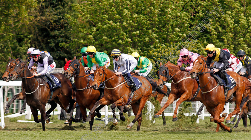 Bahamian-Sunrise-0003 
 winner BAHAMIAN SUNRISE (pink, Silvestre de Sousa) with the field through the first furlong of The Investec Asset Finance Handicap Epsom 25 Apr 2018 - Pic Steven Cargill / Racingfotos.com