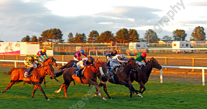 Texting-0001 
 TEXTING (right, Marco Ghiani) beats GRANDFATHER TOM (2nd right) THEGREATESTSHOWMAN (centre) and INTIMATE MOMENT (left) in The attheraces.com Handicap
Yarmouth 28 Jul 2020 - Pic Steven Cargill / Racingfotos.com