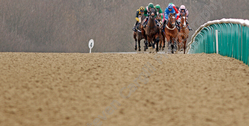 Wild-Flower-0002 
 WILD FLOWER (blue, Thore Hansen) leads the field down the hill during The Betway Handicap Lingfield 23 Feb 2018 - Pic Steven Cargill / Racingfotos.com