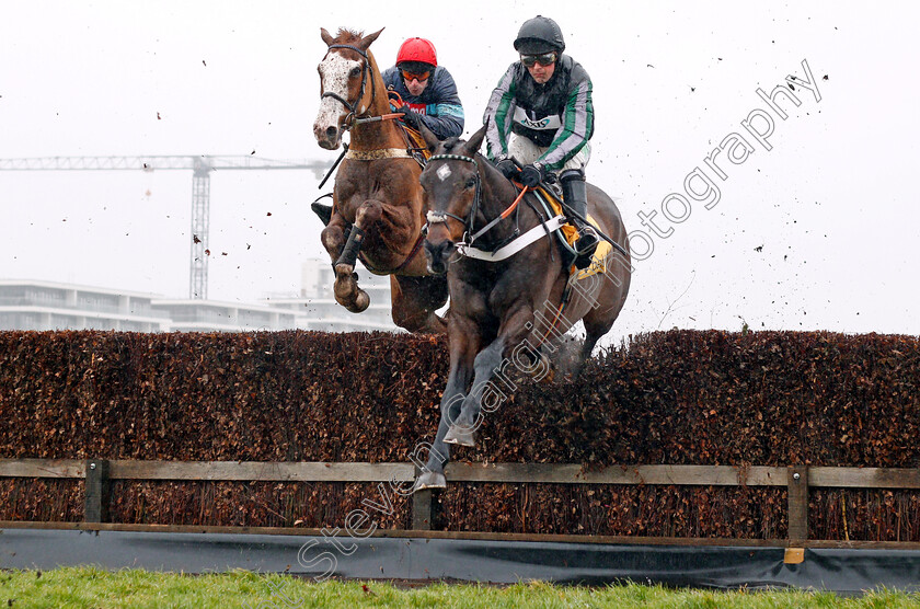 Altior-0001 
 ALTIOR (Nico de Boinville) leads VALDEZ (left) over the water jump on his way to winning The Betfair Exchange Chase Newbury 10 Feb 2018 - Pic Steven Cargill / Racingfotos.com