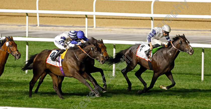 Warren-Point-0005 
 WARREN POINT (almost obscured blue cap, Mickael Barzalona) beats SEAN (right) and SOLID STONE (left) in The Dubai Millennium Stakes
Meydan 2 Feb 2024 - Pic Steven Cargill / Racingfotos.com